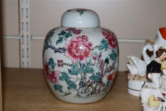 Two Chinese famille rose ginger jars and covers height 15cm